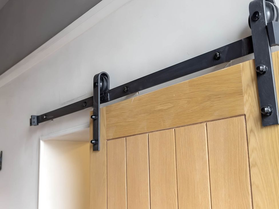 A sliding door mechanism at CentralEllesmere - Sleeps4 - Parking - PetFriendly