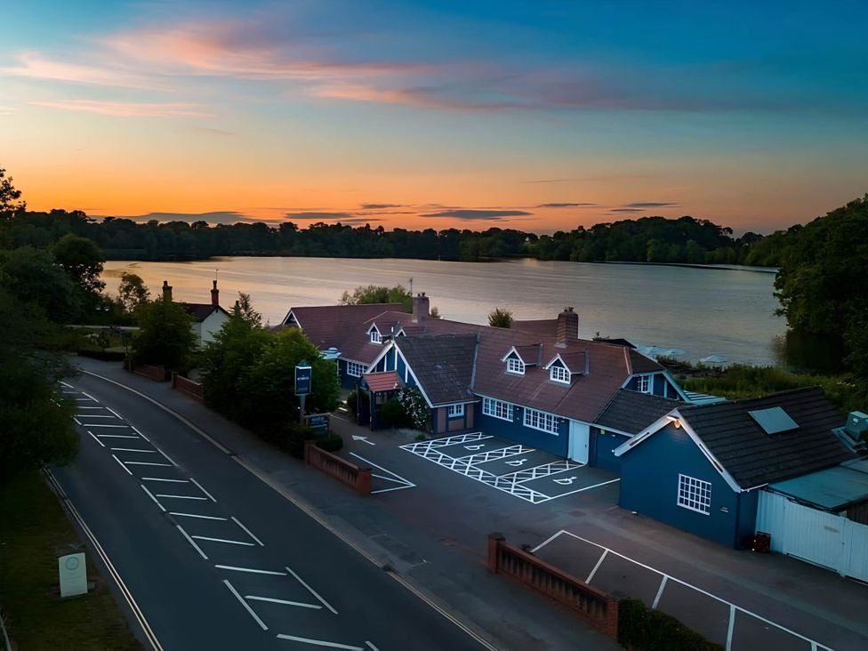 A building near a lake at CentralEllesmere - Sleeps4 - Parking - PetFriendly