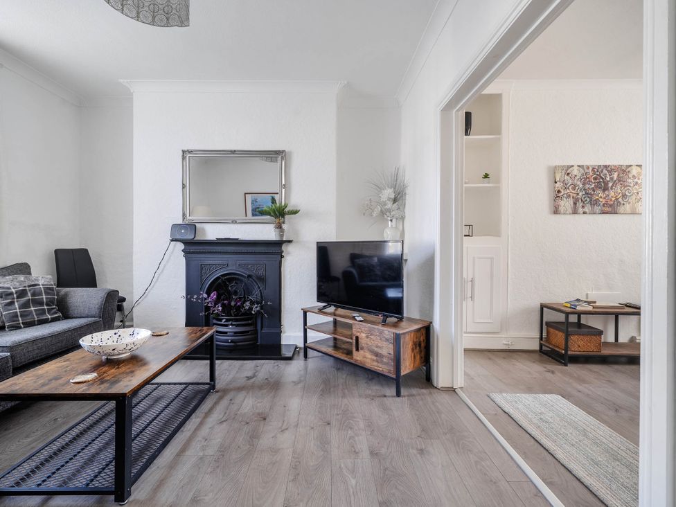 A living room with sofa and television at Torquay - House - Sleeps 6 - Pet Friendly, Torquay