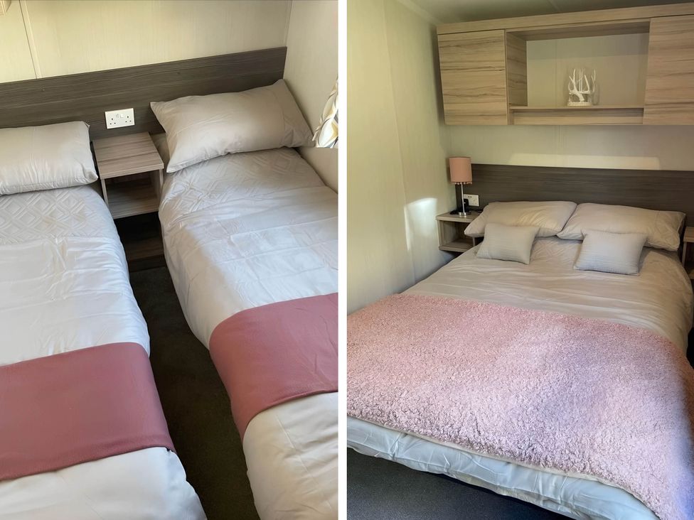 A bedroom with twin beds and a double bed at Beverley bay 2-Bed Caravan, Sleeps 6, Pet Friendly