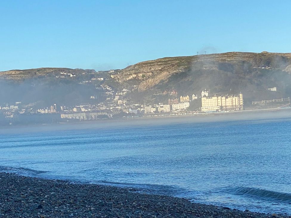 A view of the sea and buildings along the shore at Sea View, East Parade Llandudno
