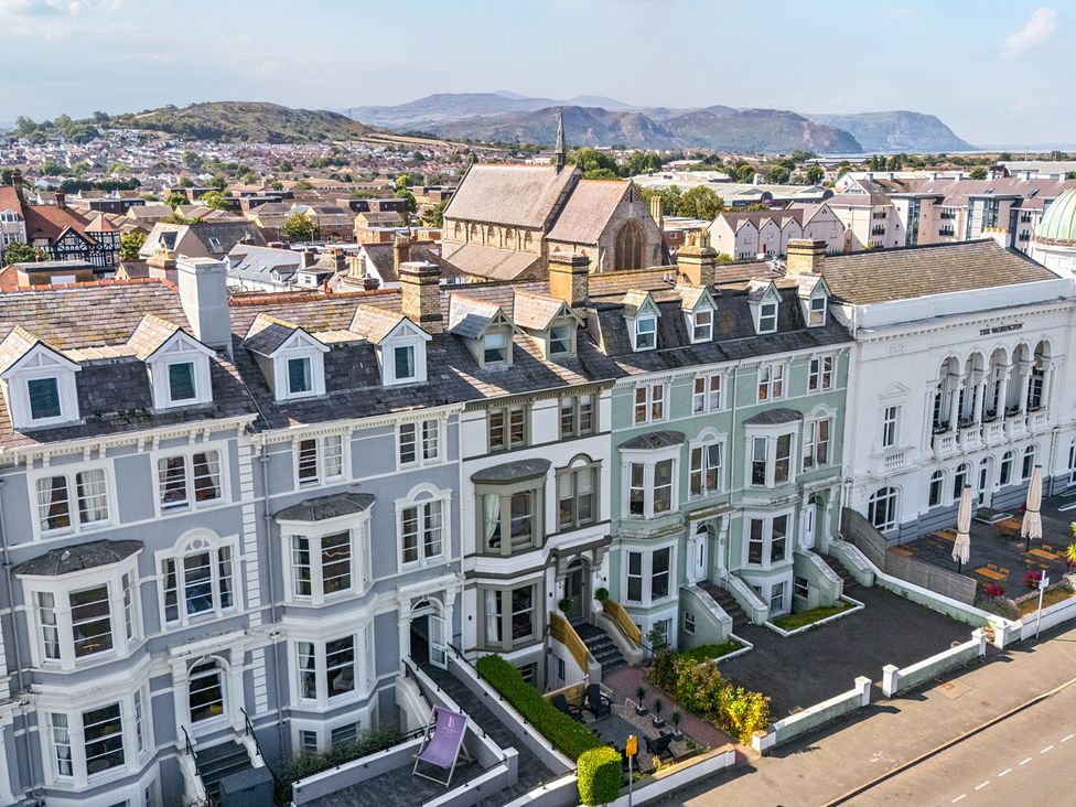 A view of houses and a walkway at Sea View, East Parade Llandudno