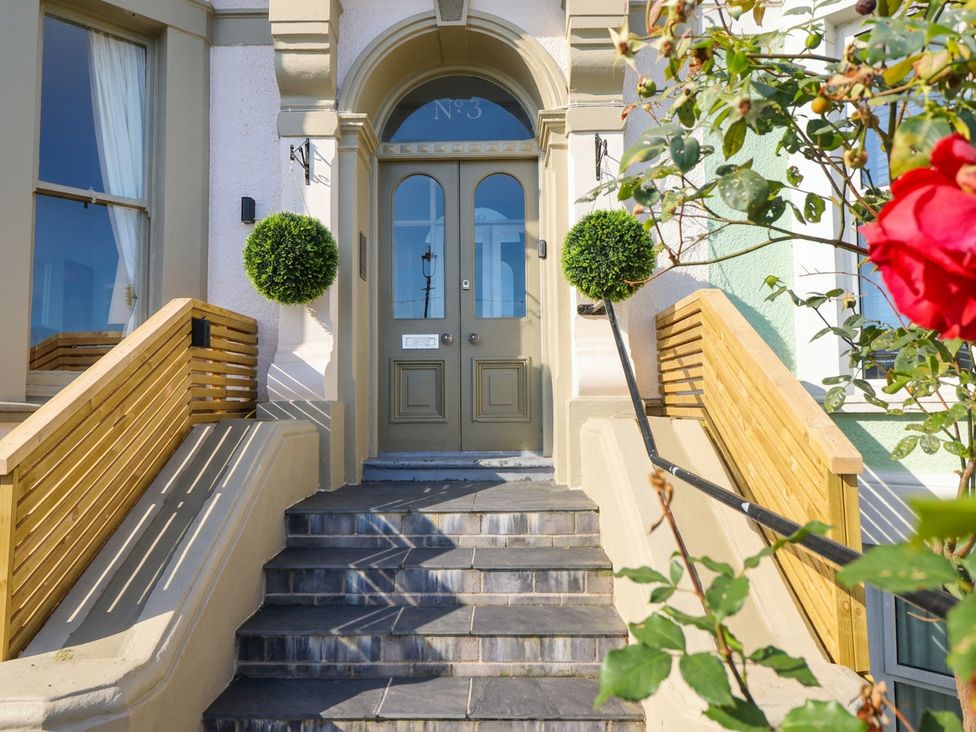 An entrance with steps and a door at Sea View, East Parade in Llandudno