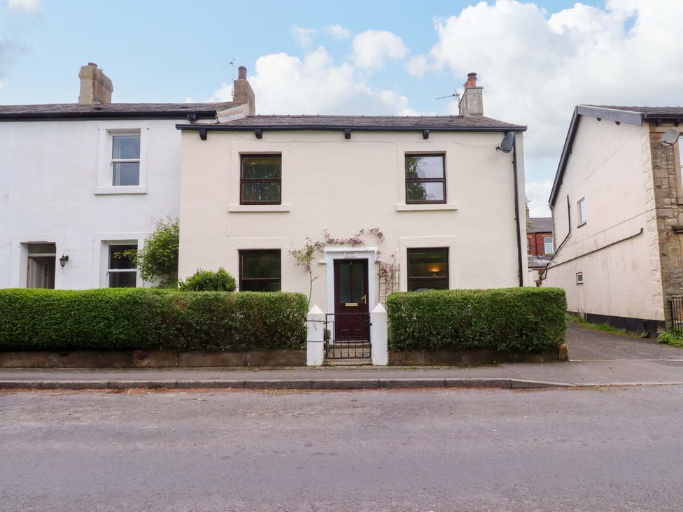 A house with a front door and windows at 6 Hazel Moor in Blackburn
