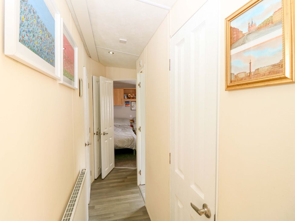 A hallway leading to a bedroom at Caravan in Cowes
