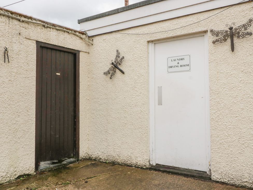 A door labeled laundry and drying room at Mews Cottage 7 Braithwaite