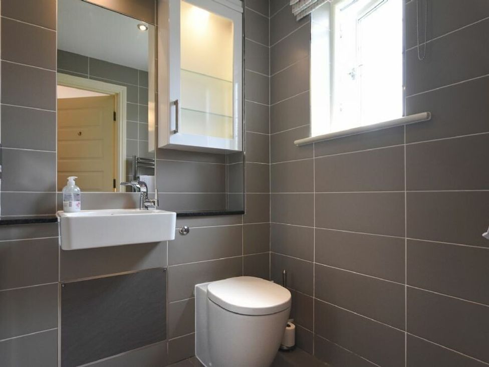 A bathroom with a sink and toilet at Northrawe Bamburgh