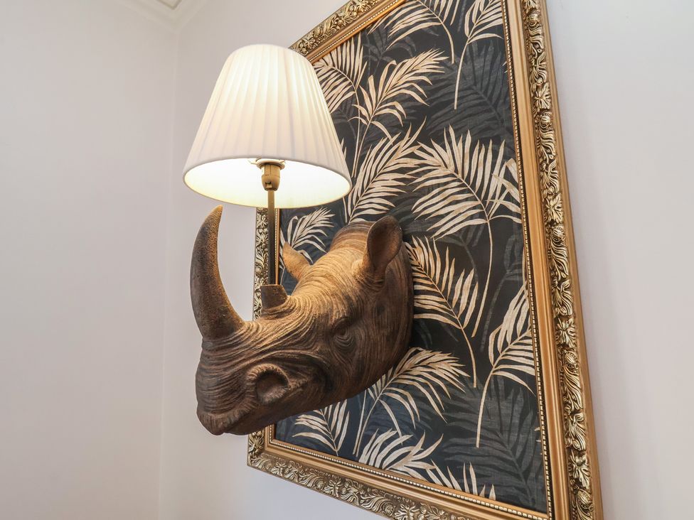 A wall sconce shaped like a rhinoceros head at Masons Place in Whitby