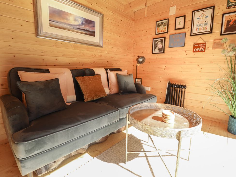 A snug with a sofa and coffee table at 4 Eve Street in Louth