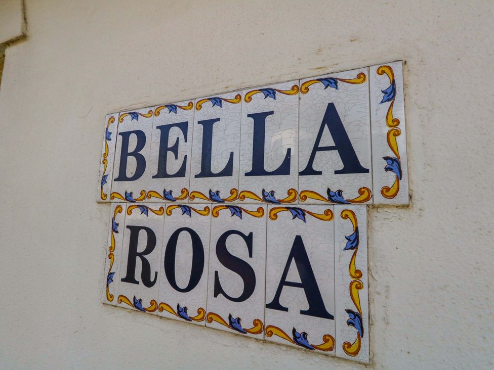 A tile sign displaying the name Bella Rosa