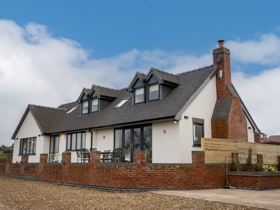 A house with a garden and patio at Greenacres Farm Harriseahead near Mow Cop