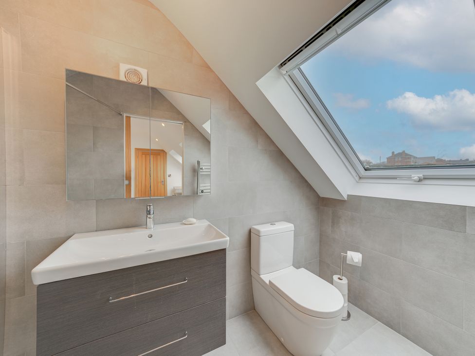 A bathroom with a sink and toilet at Greenacres Farm Harriseahead near Mow Cop