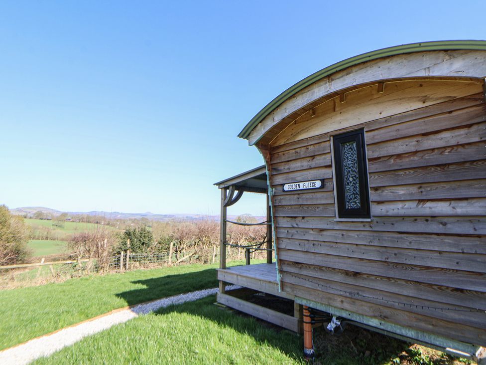 A wooden structure labeled Golden Fleece at Golden Fleece in Biddulph Moor