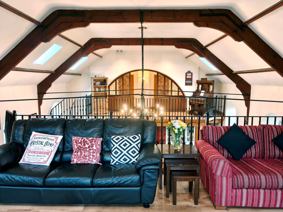 A living room with sofas and a coffee table at Kaber Chapel near Kirby Stephen