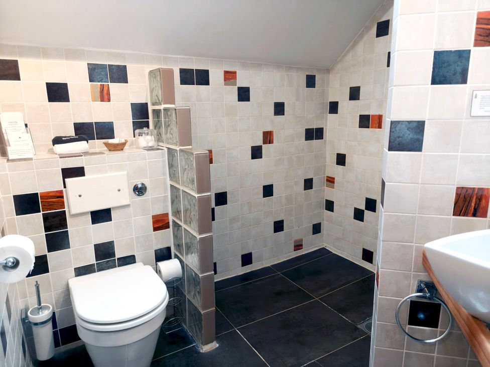 A bathroom with a toilet and sink at Kaber Chapel near Kirby Stephen