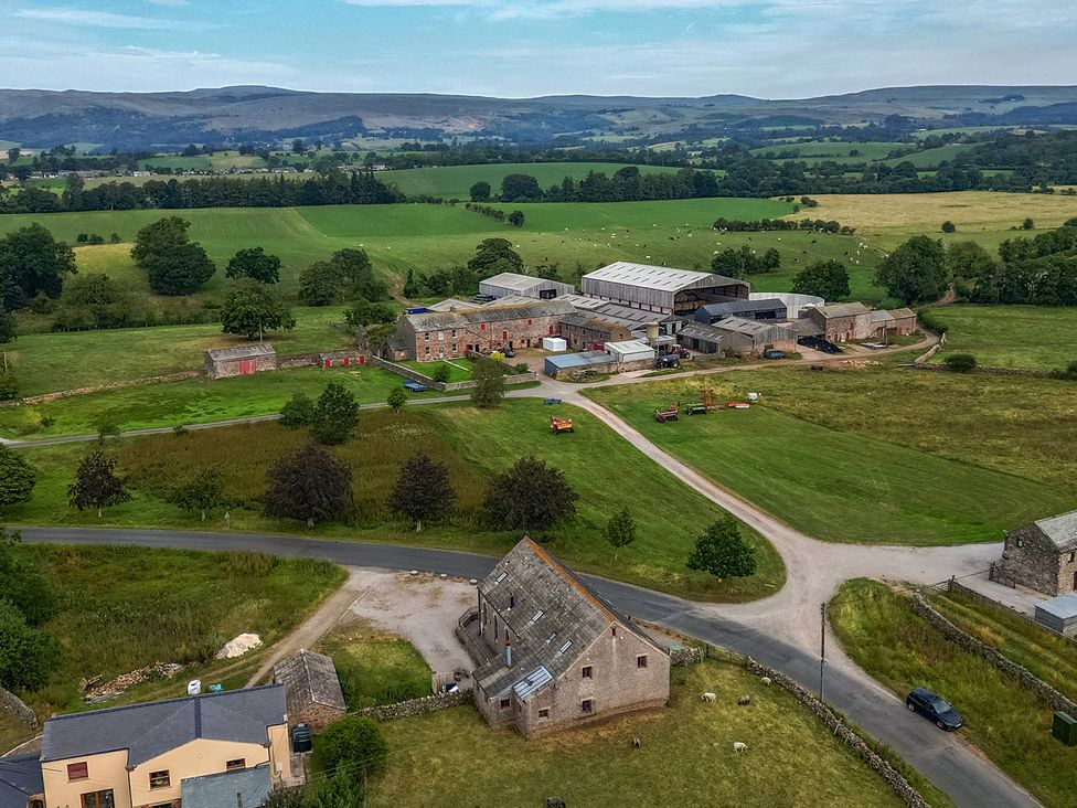 A view of farm buildings and fields at Kaber Chapel in Kaber near Kirkby Stephen