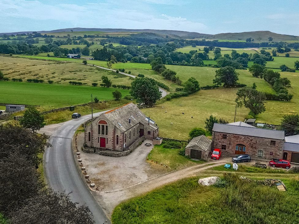 A building by the road surrounded by fields at Kaber Chapel near Kirkby Stephen