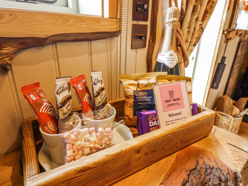 A selection of snacks and a welcome note at Twit Twoo Shepherds Hut in North Somercotes