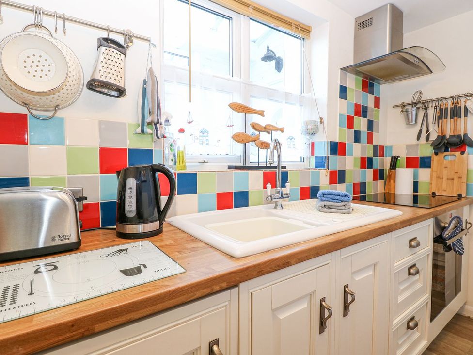 A kitchen with a kettle and toaster at Hideaway Cottage Hunstanton