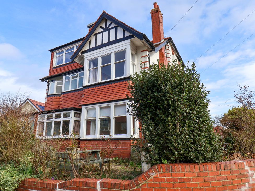 A house with a garden and patio at 11 Peasholm Avenue in Scarborough