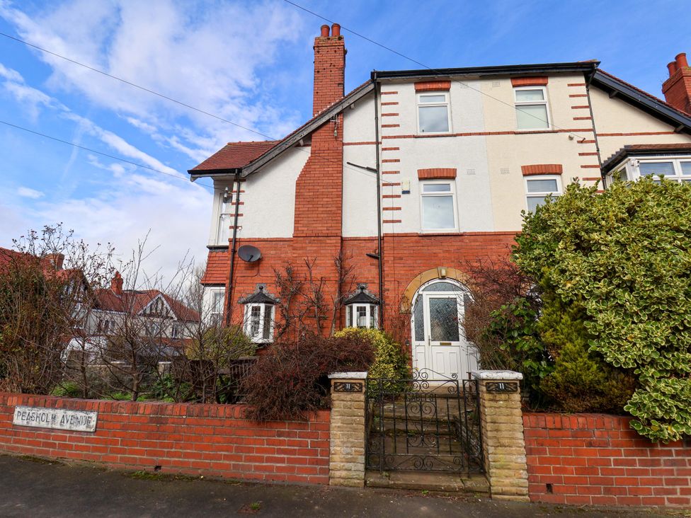 A house with a garden and front door at 11 Peasholm Avenue in Scarborough