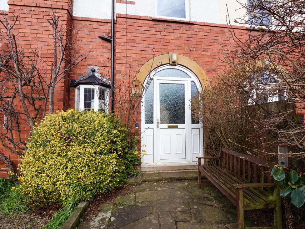 An outdoor entryway with a front door and a bench at 11 Peasholm Avenue Scarborough