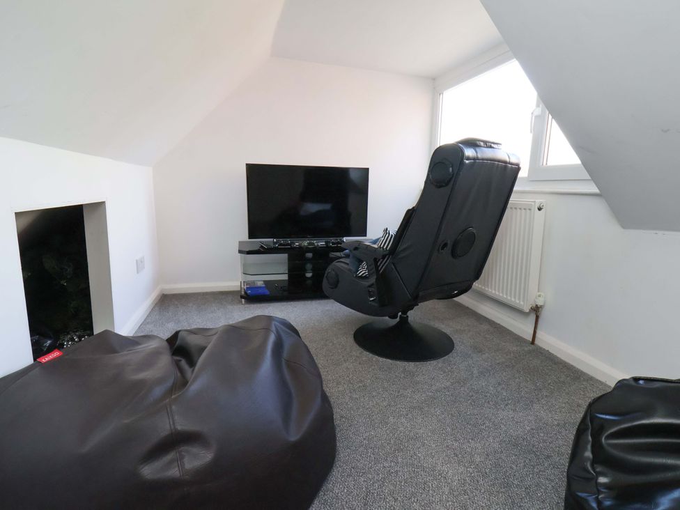 An attic with a television and bean bags at 11 Peasholm Avenue, Scarborough