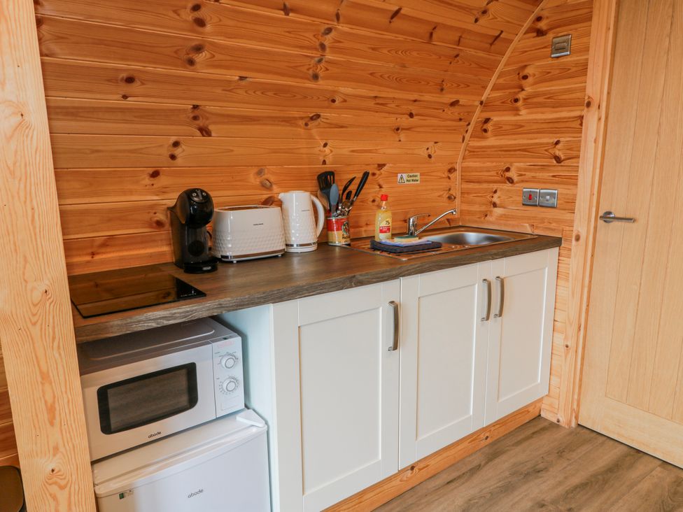 A kitchen with appliances and sink at Keith in Stoneykirk near Sandhead
