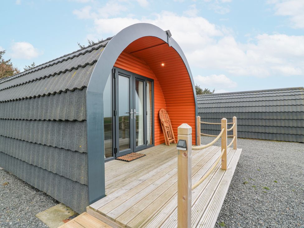 An outdoor pod structure with a wooden deck at Keith in Stoneykirk near Sandhead