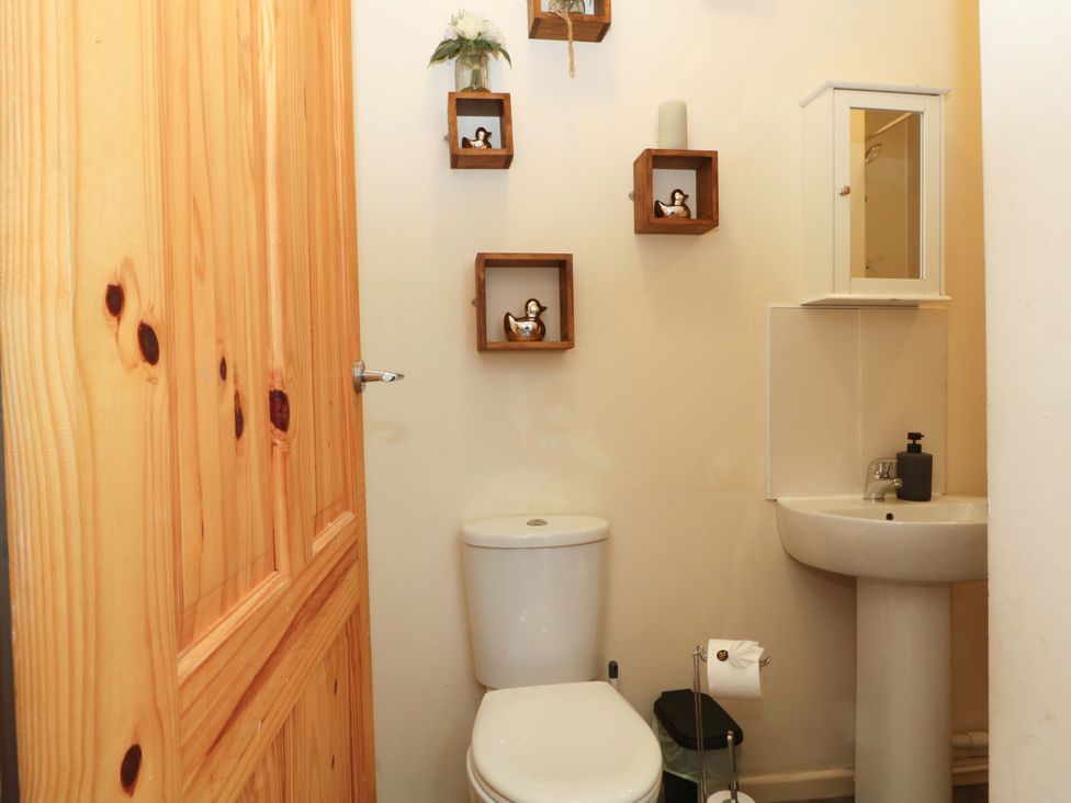 A bathroom with toilet and sink at Victoria Place in Accrington