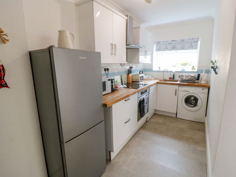 A kitchen with appliances and countertop at The Hideaway in Whitby