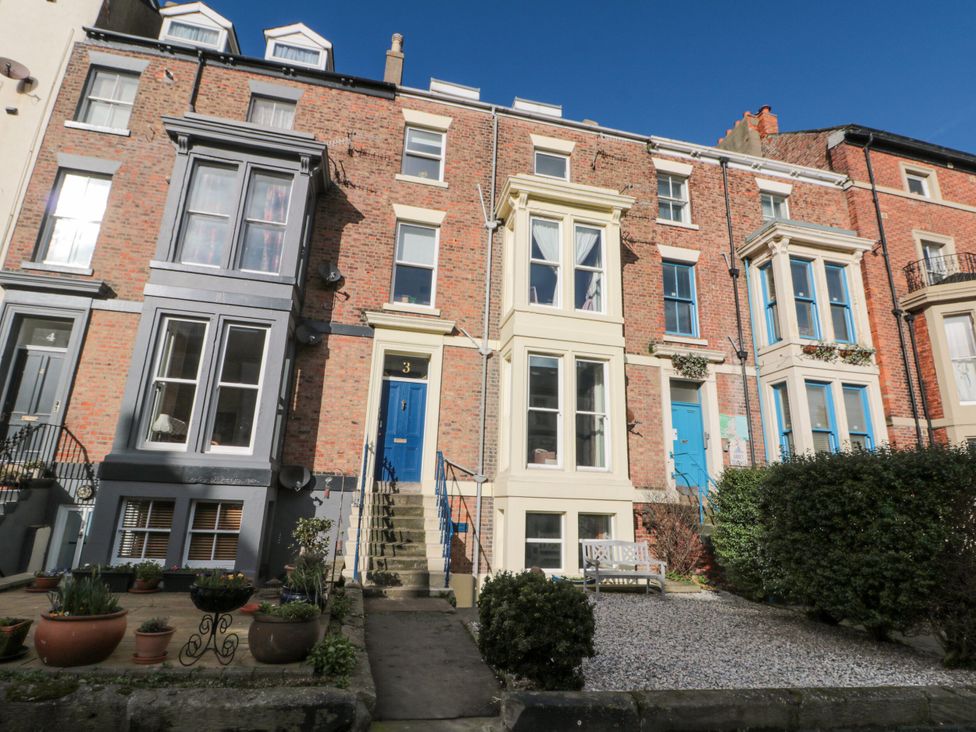A building exterior with stairs and windows at Cuckoo's Nest in Whitby