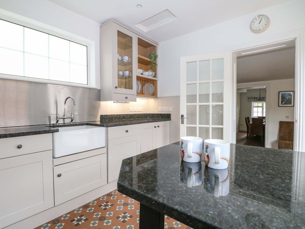 A kitchen with sink and cabinets at 19 Queen Street Emsworth