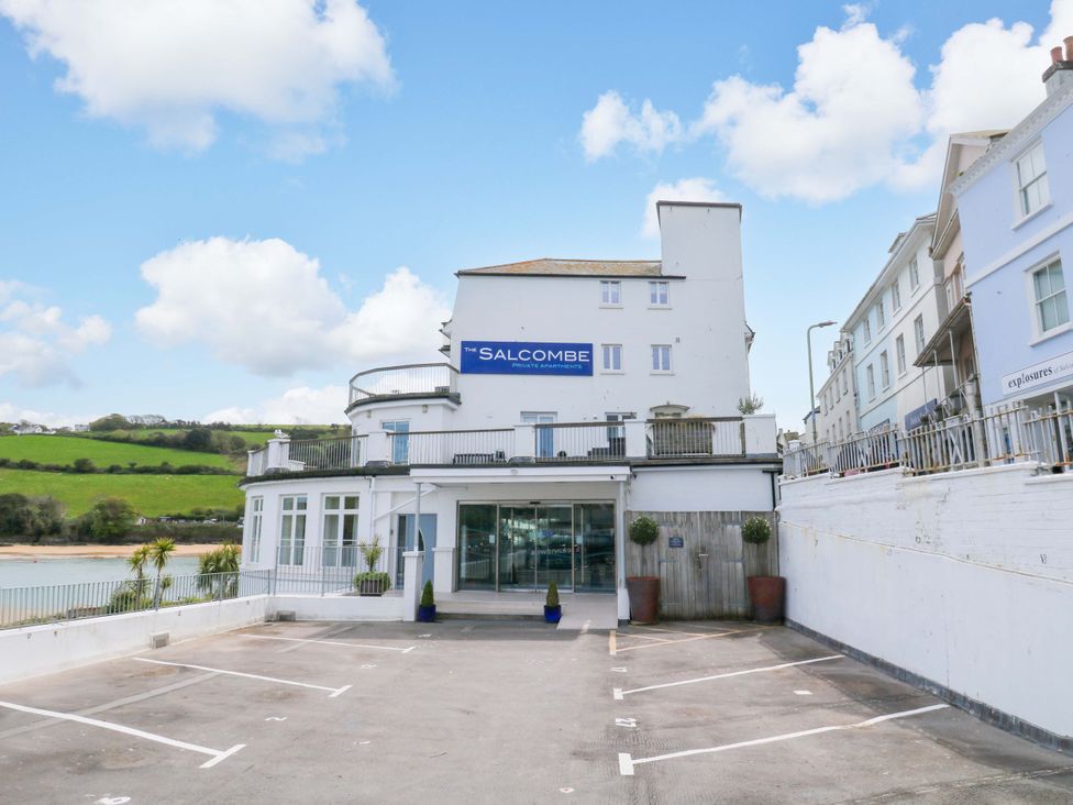 A building with a sign at The Salcombe in Salcombe
