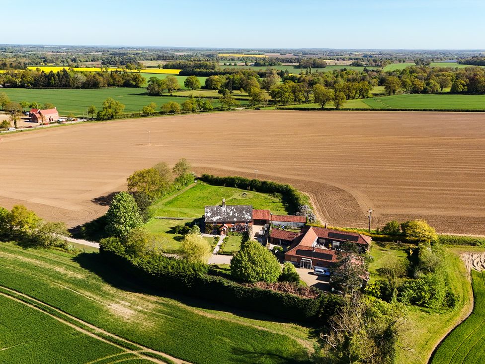 A farmhouse surrounded by fields at Cutbush Farmhouse in Hingham