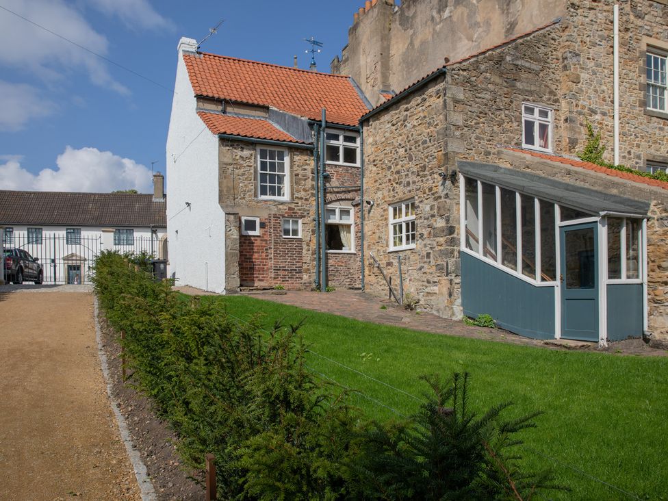A house with garden and pathway at Palace Garden Cottage in Bishop Auckland