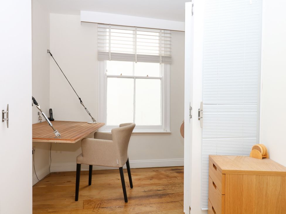 An office with a desk and chair at Dennings House, Mayors Avenue, Dartmouth