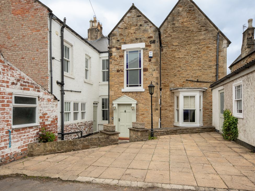 An entrance with a door and windows at The Clarence in Bishop Auckland