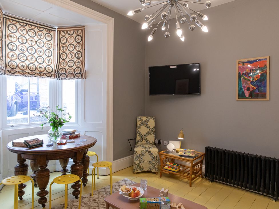A dining room with a table and chairs at The Clarence in Bishop Auckland