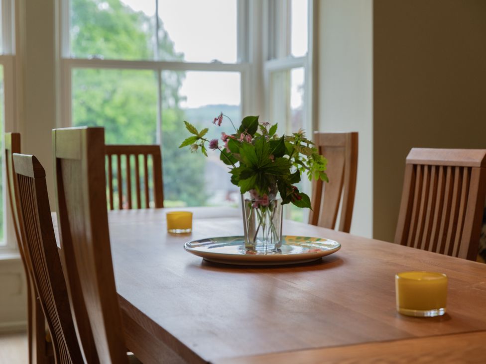 A dining room with a table and chairs at The Clarence in Bishop Auckland