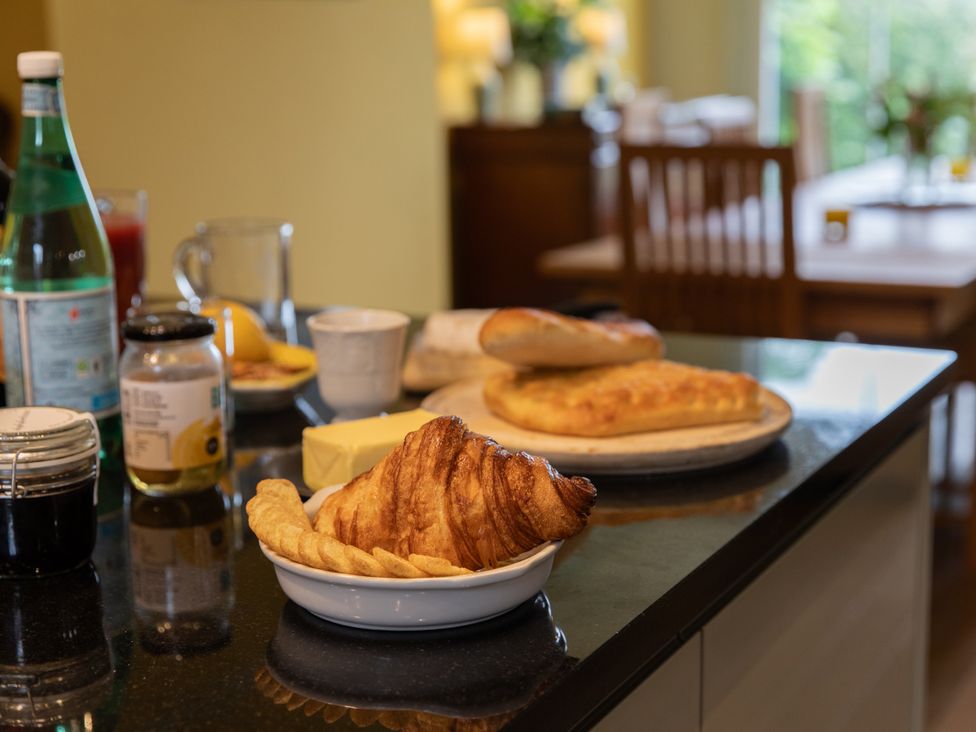 A kitchen with pastries and beverages at The Clarence in Bishop Auckland