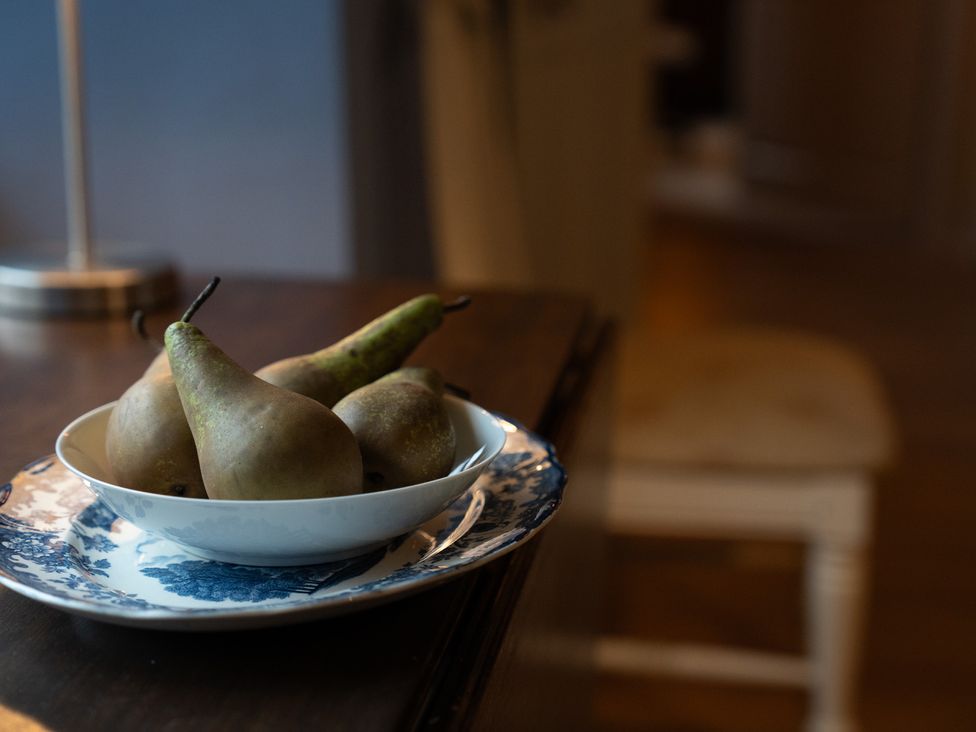 A bowl of pears on a table at Churchill Cottage in Bishop Auckland