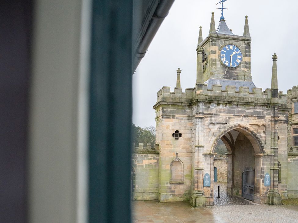 A clock tower and archway at Churchill Cottage in Bishop Auckland
