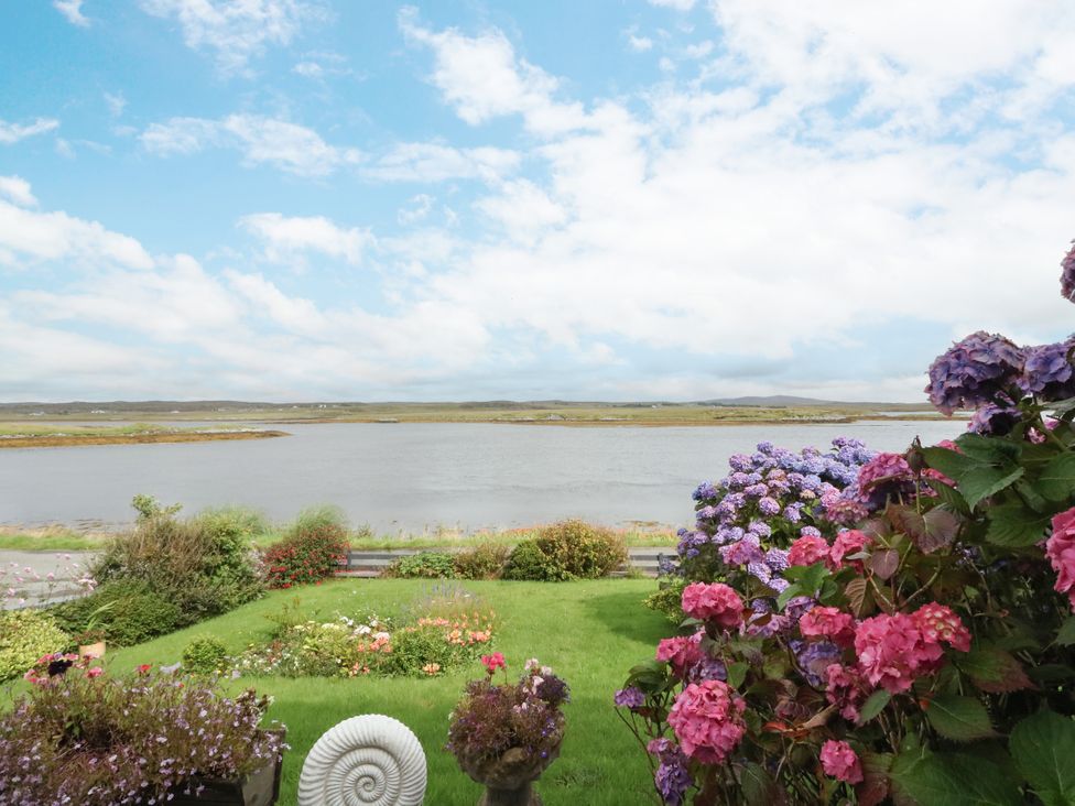 A view of water and flowers at 3 Linshader, Stornoway