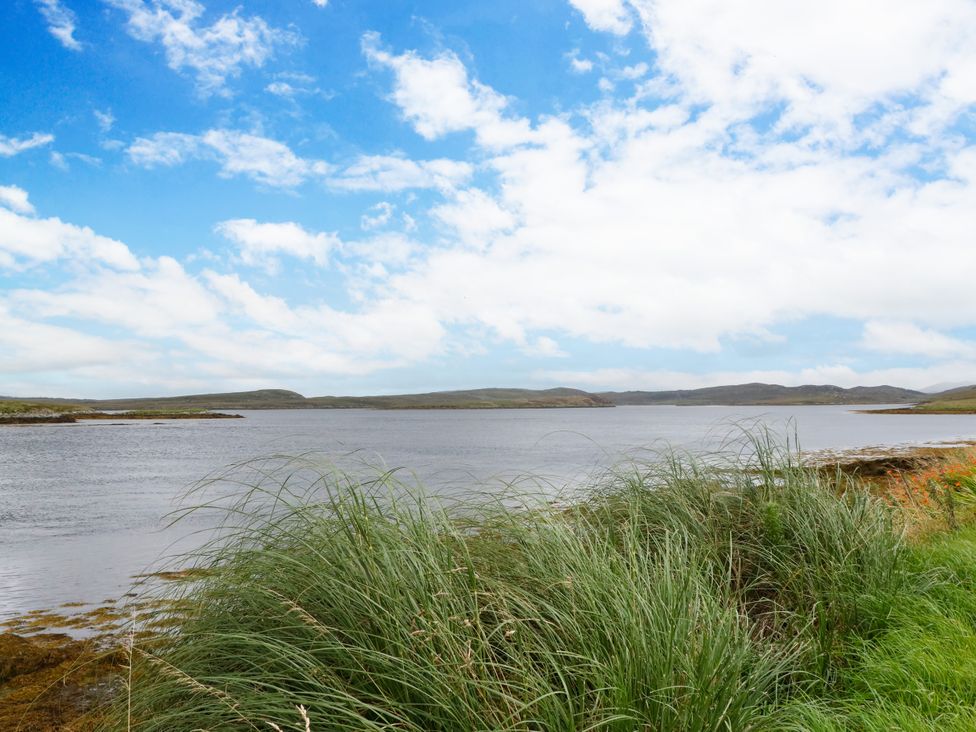 A landscape view of water and hills at 3 Linshader, Stornoway