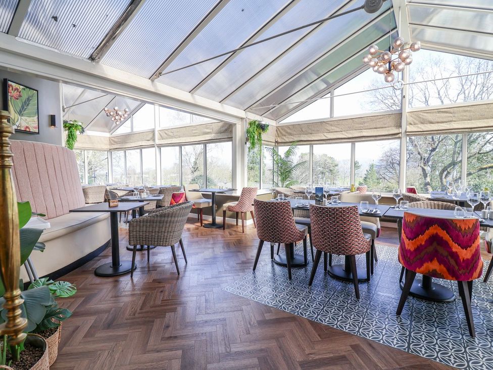 A dining room with various seating arrangements at Willerby Malton Ruthin