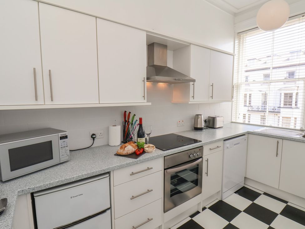 A kitchen with appliances and food items at Time Out in Whitby