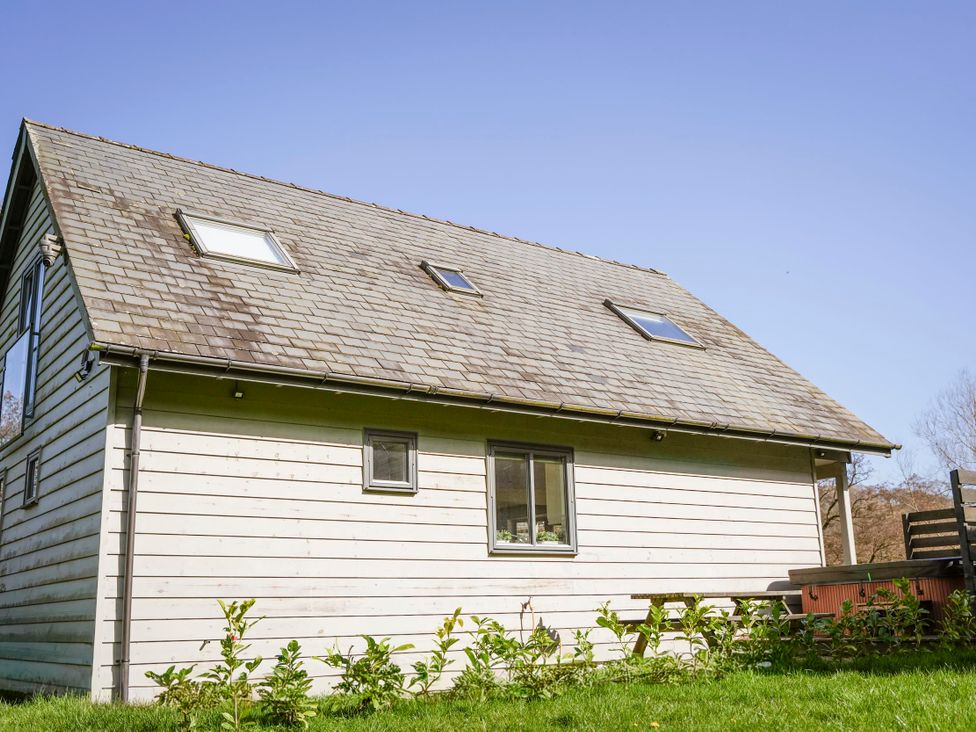 A house with windows and skylights at Maple Lodge in Llangunllo