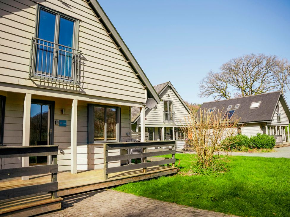 Houses with balconies and grassy area at Willow Lodge Laceby