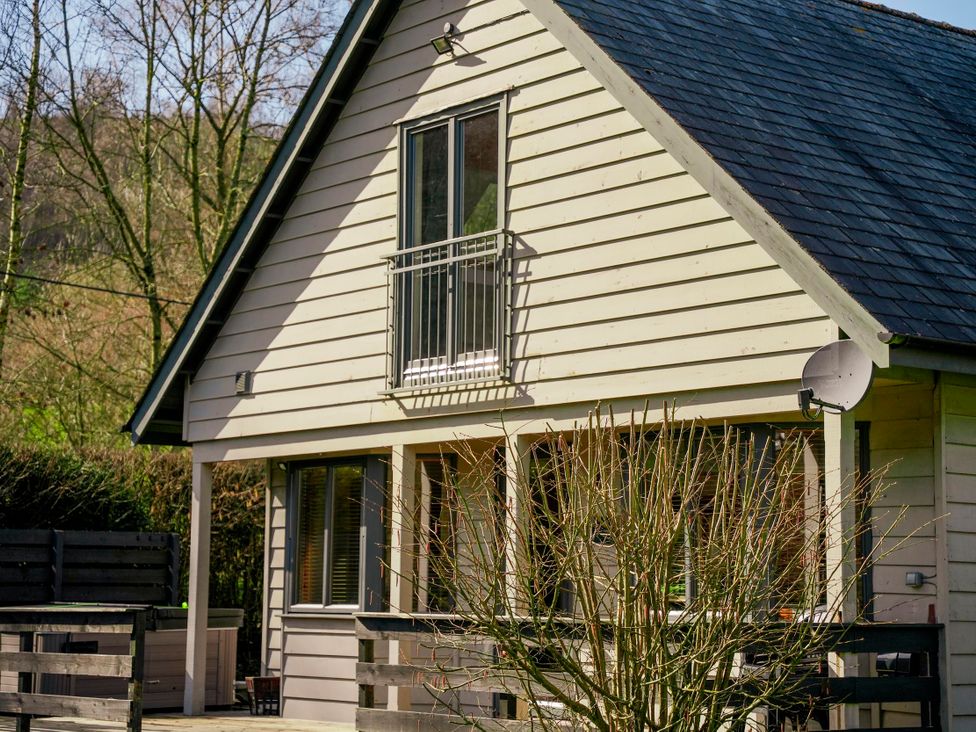 A house with a balcony and satellite dish at Willow Lodge Laceby